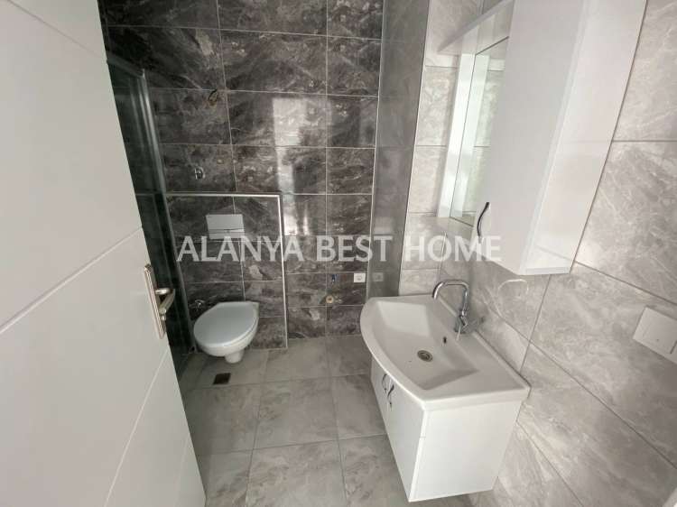 OBA'DA AKTİVİTELİ SİTE İÇERİSİNDE DENİZ VE KALE MANZARALI GÜNEY CEPHE 1+1 SATILIK DAİRE