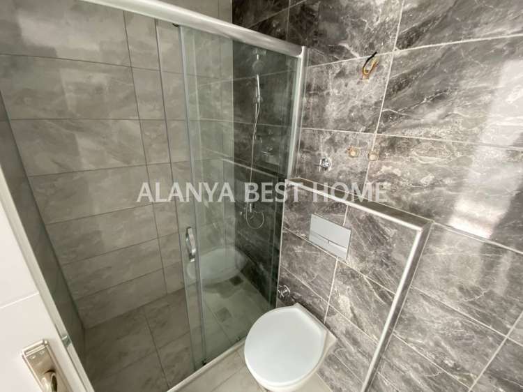 OBA'DA AKTİVİTELİ SİTE İÇERİSİNDE DENİZ VE KALE MANZARALI GÜNEY CEPHE 1+1 SATILIK DAİRE