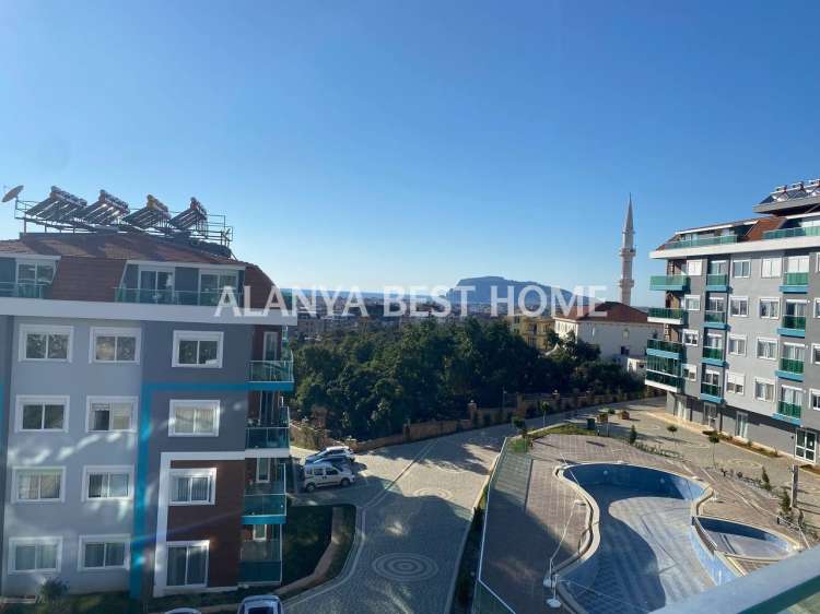 OBA'DA AKTİVİTELİ SİTE İÇERİSİNDE DENİZ VE KALE MANZARALI GÜNEY CEPHE 1+1 SATILIK DAİRE