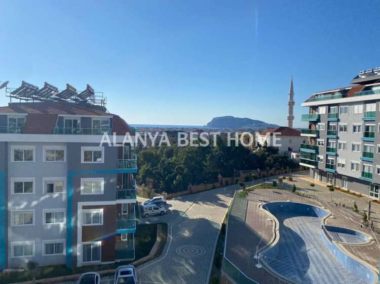 OBA'DA AKTİVİTELİ SİTE İÇERİSİNDE DENİZ VE KALE MANZARALI GÜNEY CEPHE 1+1 SATILIK DAİRE