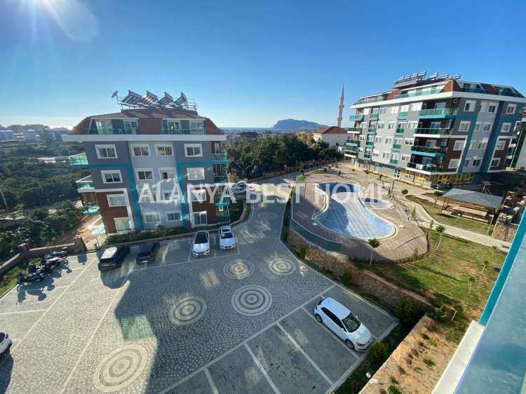 OBA'DA AKTİVİTELİ SİTE İÇERİSİNDE DENİZ VE KALE MANZARALI GÜNEY CEPHE 1+1 SATILIK DAİRE