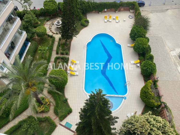 CİKCİLLİ'DE AKTİVİTELİ SİTE İÇERİSİNDE DENİZ VE KALE MANZARALI 4+1 EŞYALI DUBLEKS DAİRE